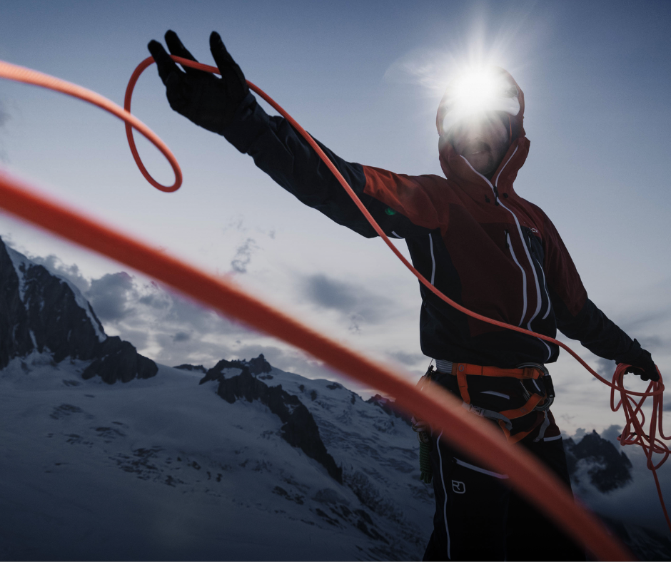 safety hub_mobile_products_2 mountaineer, climber, ice climbing rope, snowy mountains, hiking jacket