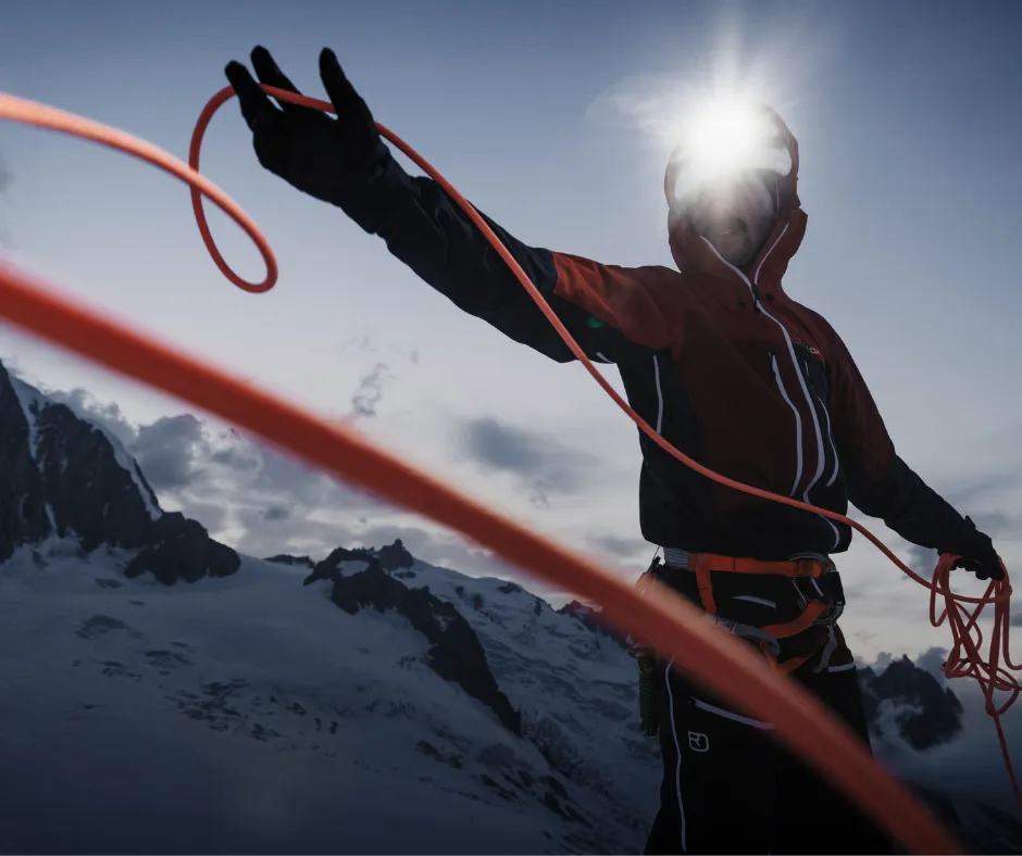 mountaineer, climber, ice climbing rope, snowy mountains, hiking jacket