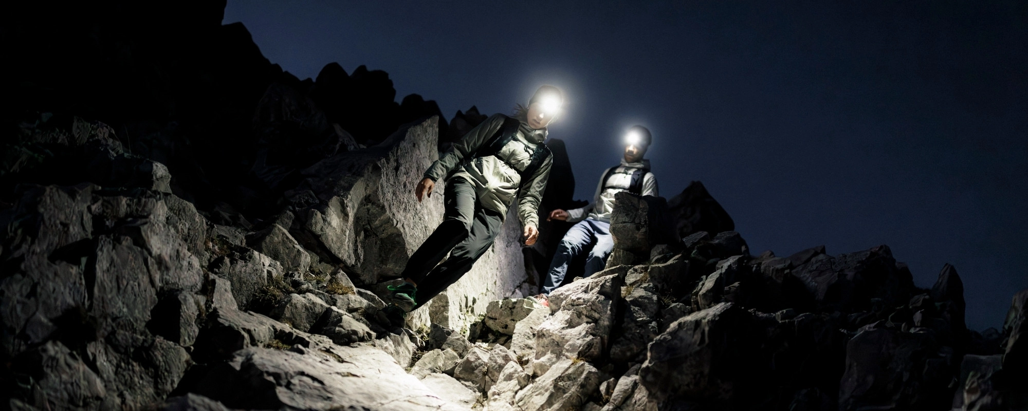 ORTOVOX_Startseite_Brand_Header_Desktop hiking, rocky terrain, night, headlamp, outdoor gear