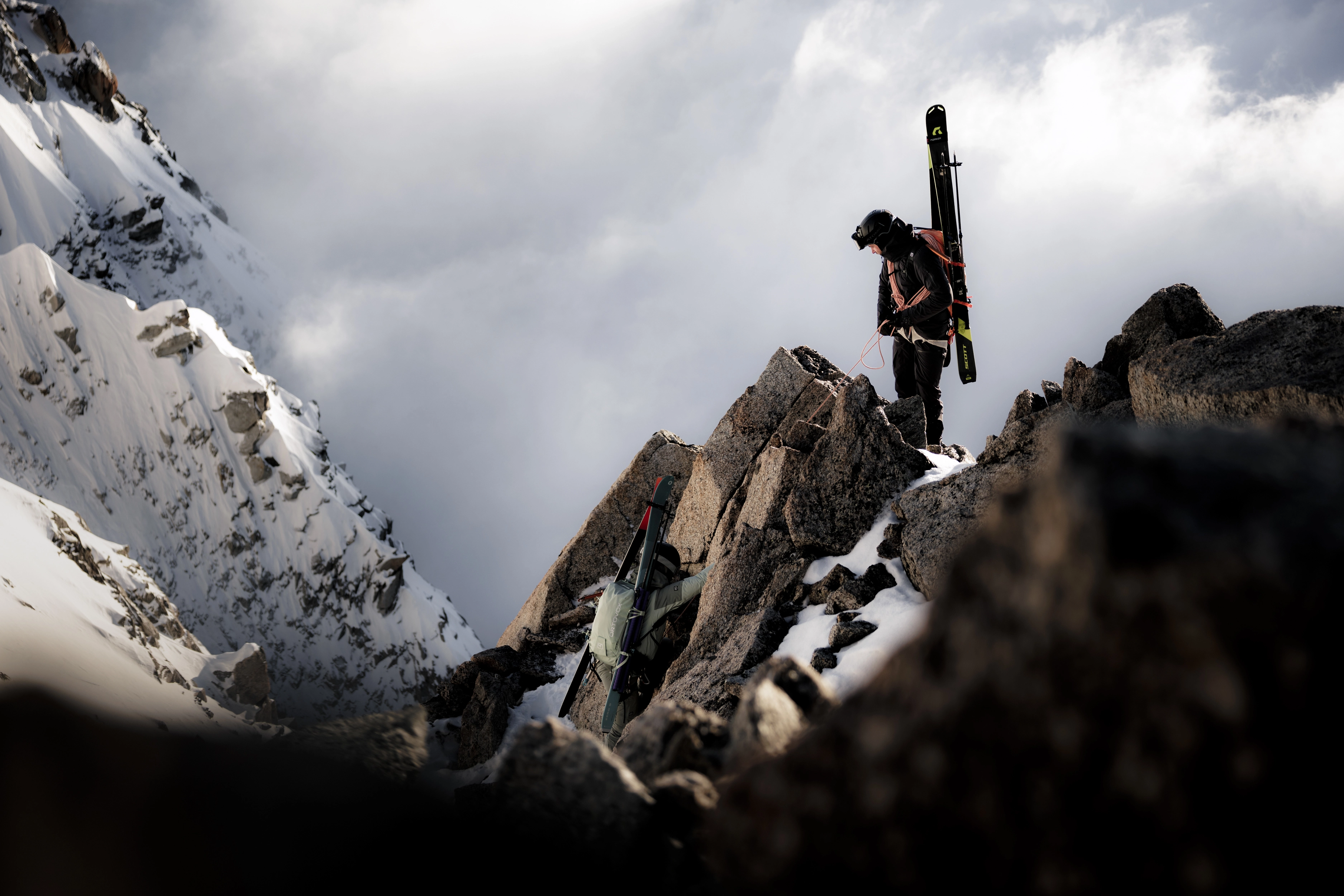 DB_9354-2_SKITOUR_WS2627_Charmonix_MaxDraeger_MedRes ski, mountaineering, cliff, snow, backpack