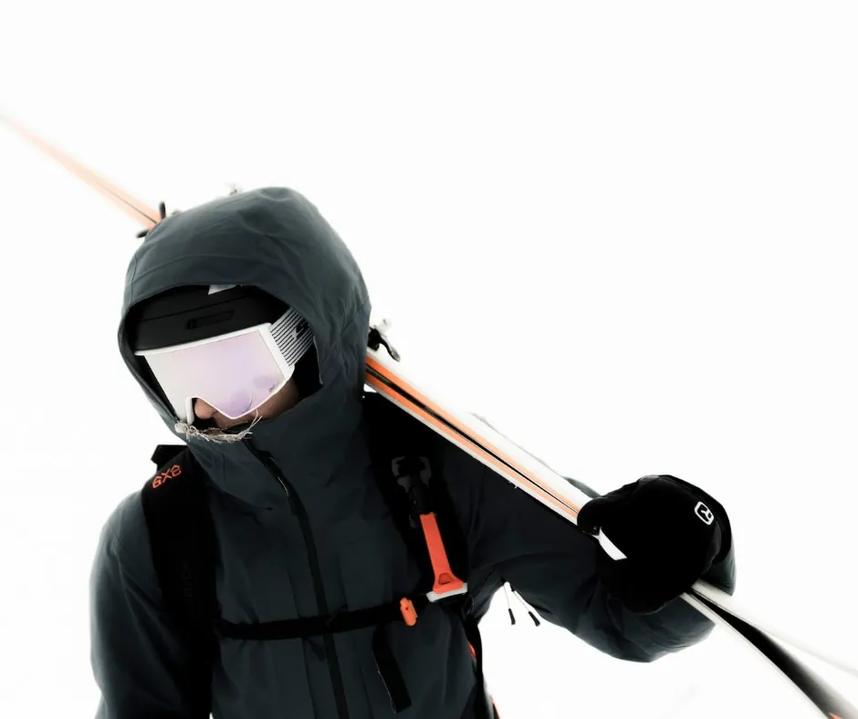 ski, snowboard, goggles, jacket, gloves