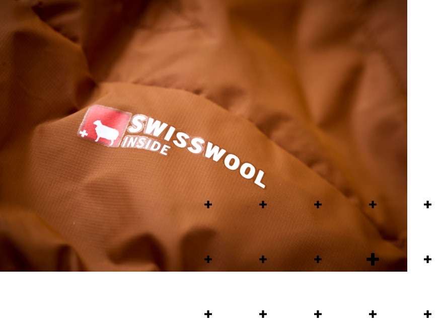 swisswool-teaser-intro Clothing, Coat, Person, Logo
